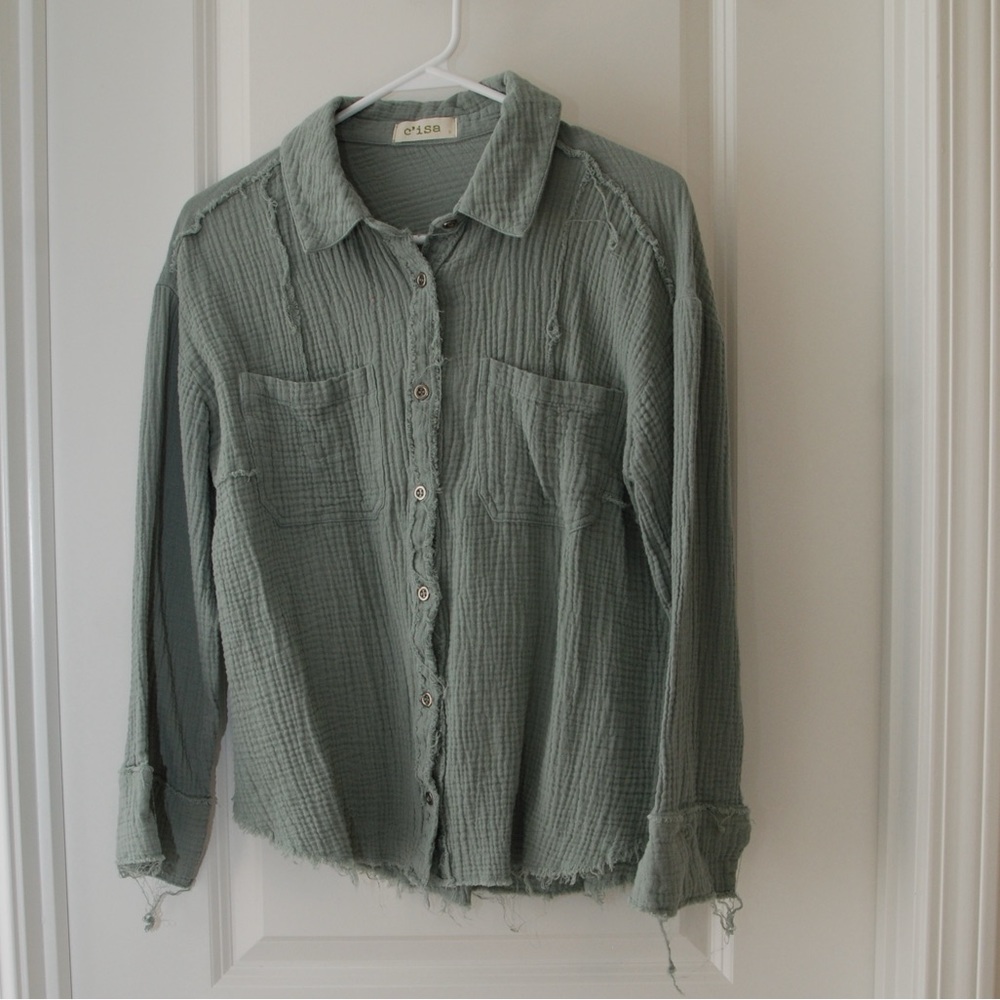 Women’s sage green distressed Circa shirt. Size small.